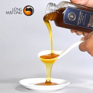 hình ảnh rót mật của mật ong Honimore Cha Rồng